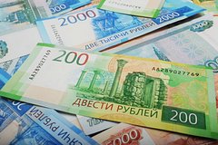 Аналитик назвал выгодный для России курс доллара