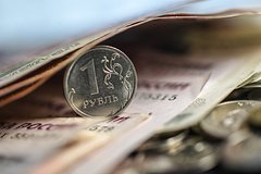 Аналитики допустили резкие колебания курса рубля
