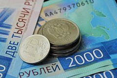 Аналитики ухудшили прогноз курса рубля